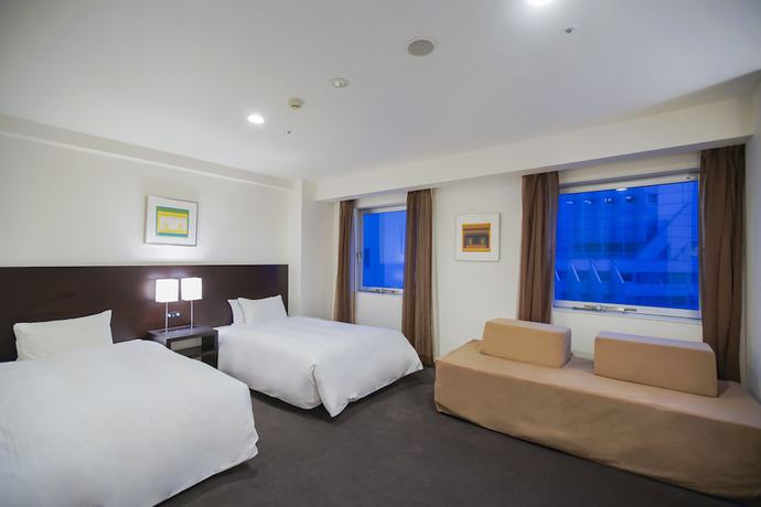 Imagen de la habitación del Hotel Sunroute Tokushima. Foto 2