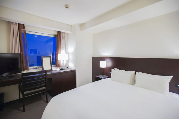 Imagen de la habitación del Hotel Sunroute Tokushima. Foto 8