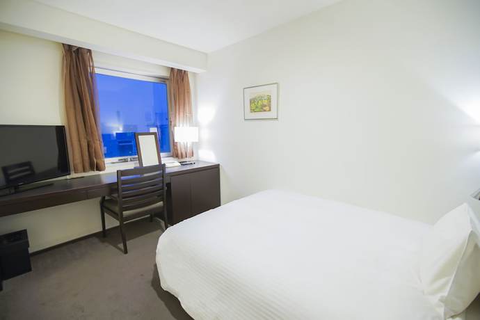 Imagen de la habitación del Hotel Sunroute Tokushima. Foto 9