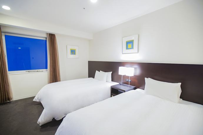Imagen de la habitación del Hotel Sunroute Tokushima. Foto 10