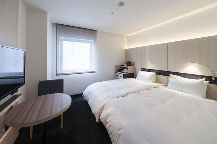Imagen de la habitación del Hotel Sunroute Tokushima. Foto 12