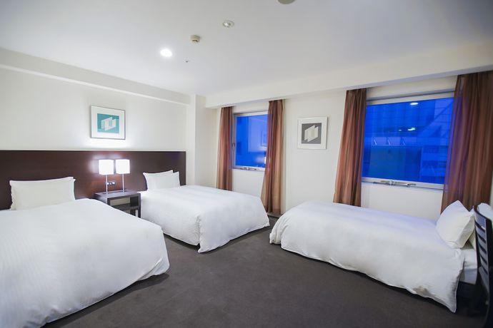 Imagen de la habitación del Hotel Sunroute Tokushima. Foto 16