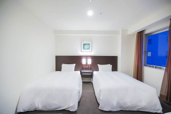 Imagen de la habitación del Hotel Sunroute Tokushima. Foto 18
