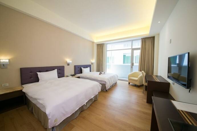 Imagen de la habitación del Hotel Sunseed International Villa. Foto 11