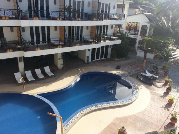 Imagen de la piscina del Hotel Sunset At Aninuan Beach Resort. Foto 5