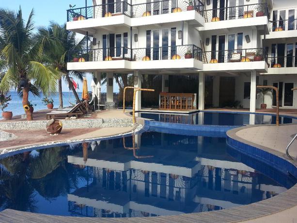Imagen de la piscina del Hotel Sunset At Aninuan Beach Resort. Foto 6