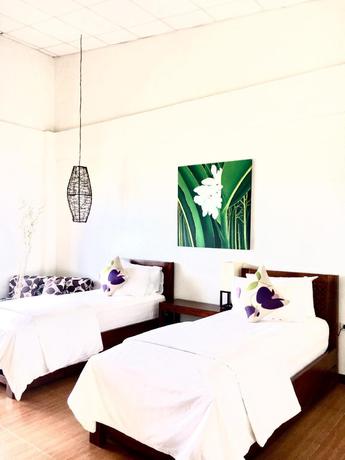 Imagen de la habitación del Hotel Sunset At Aninuan Beach Resort. Foto 3