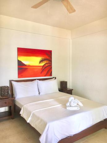 Imagen de la habitación del Hotel Sunset At Aninuan Beach Resort. Foto 4