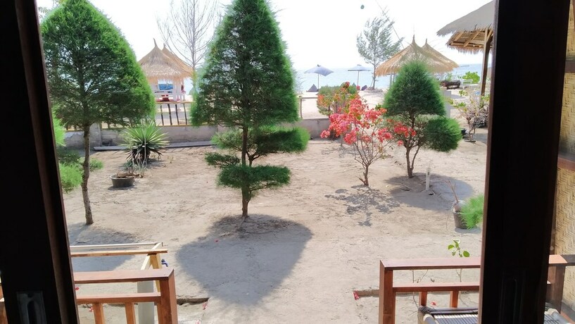 Imagen de la habitación del Hotel Sunset Beach Bungalow and Restaurant. Foto 11