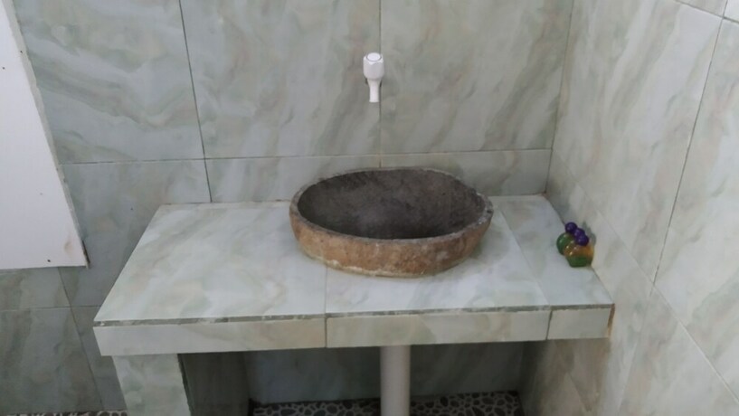 Imagen de la habitación del Hotel Sunset Beach Bungalow and Restaurant. Foto 14