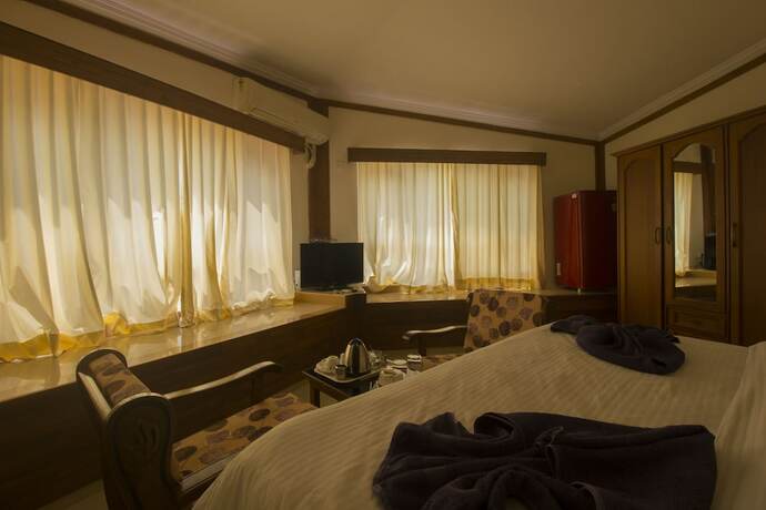 Imagen de la habitación del Hotel Sunset Beach Resort, Candolim. Foto 19