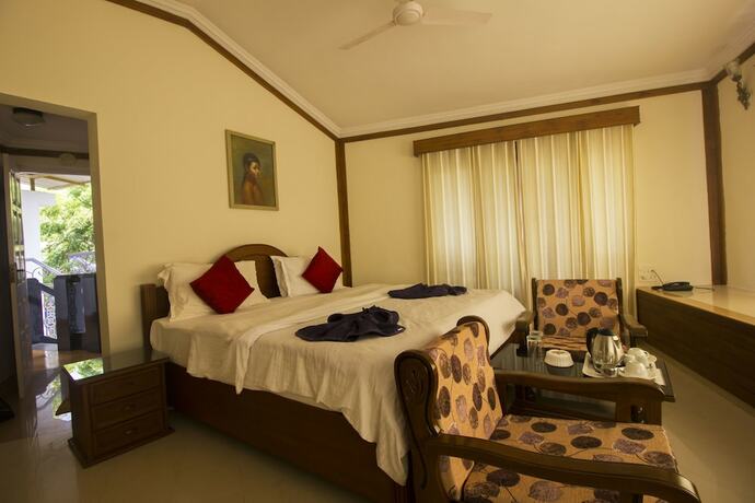 Imagen de la habitación del Hotel Sunset Beach Resort, Candolim. Foto 20