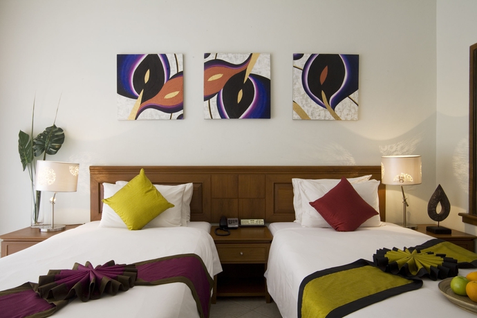 Imagen de la habitación del Hotel Sunset Beach Resort. Foto 9