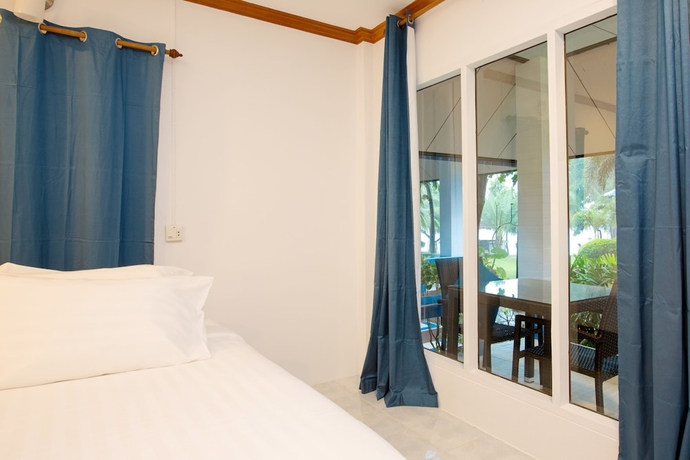 Imagen de la habitación del Hotel Sunset Beach Villas. Foto 4