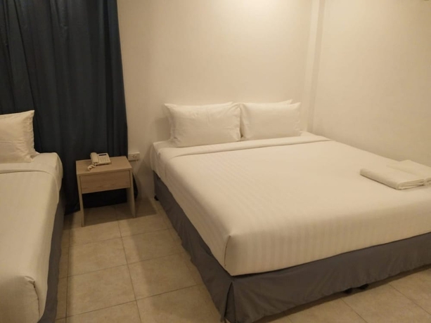 Imagen de la habitación del Hotel Sunset Beach Villas. Foto 10