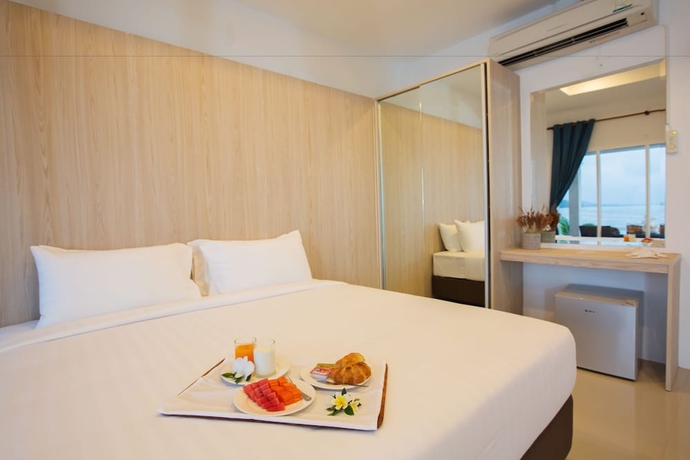 Imagen de la habitación del Hotel Sunset Beach Villas. Foto 15