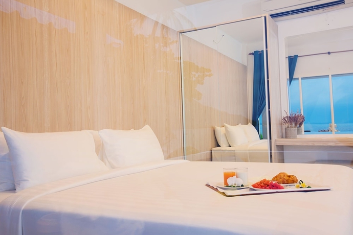 Imagen de la habitación del Hotel Sunset Beach Villas. Foto 16