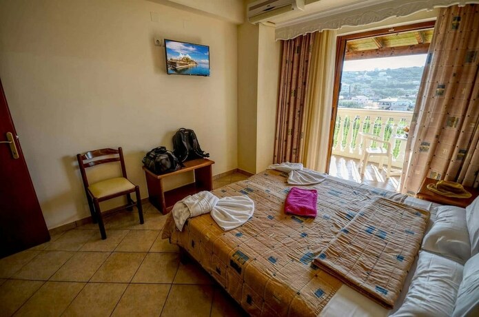 Imagen de la habitación del Hotel Sunset Blue Agios Stefanos. Foto 5