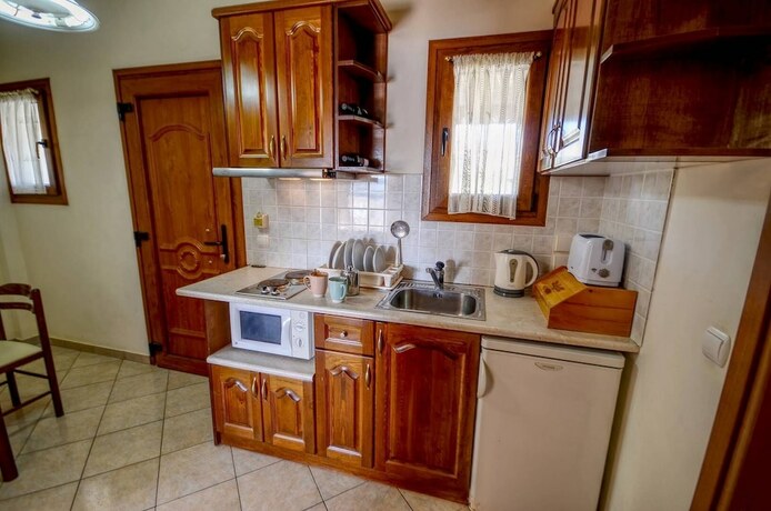 Imagen de la habitación del Hotel Sunset Blue Agios Stefanos. Foto 8