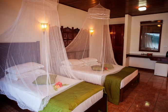 Imagen de la habitación del Hotel Sunset Bungalows. Foto 5