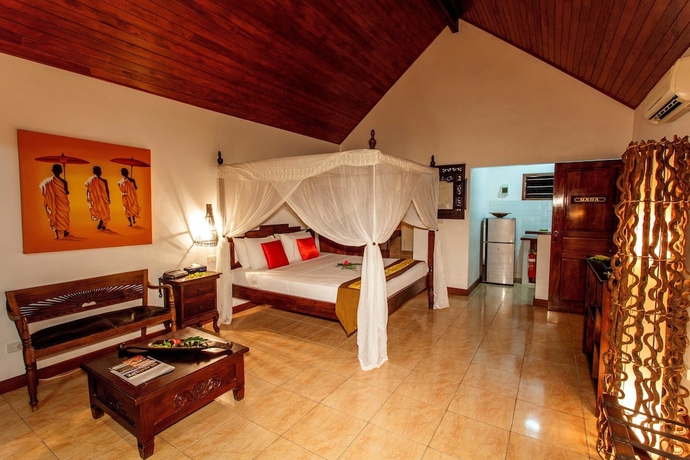 Imagen de la habitación del Hotel Sunset Bungalows. Foto 6