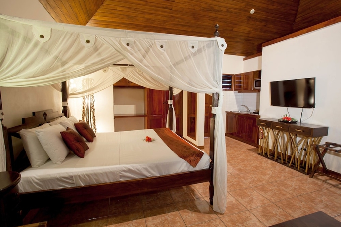 Imagen de la habitación del Hotel Sunset Bungalows. Foto 8