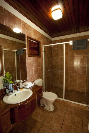 Imagen de la habitación del Hotel Sunset Bungalows. Foto 11