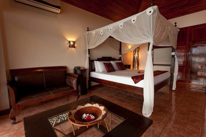 Imagen de la habitación del Hotel Sunset Bungalows. Foto 13
