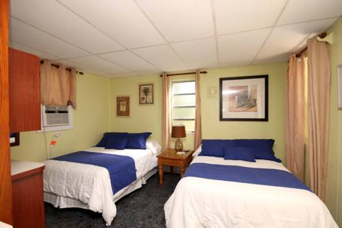 Imagen de la habitación del Hotel Sunset Cove Beach Resort. Foto 4
