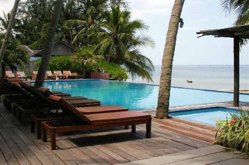 Imagen de la habitación del Hotel Sunset Cove Resort. Foto 2