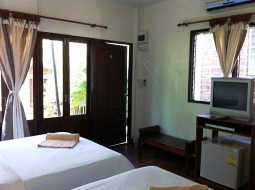 Imagen de la habitación del Hotel Sunset Cove Resort. Foto 3