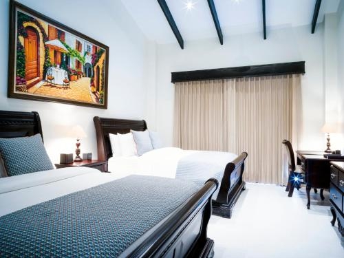 Imagen de la habitación del Hotel Sunset Del Mar Resort. Foto 9