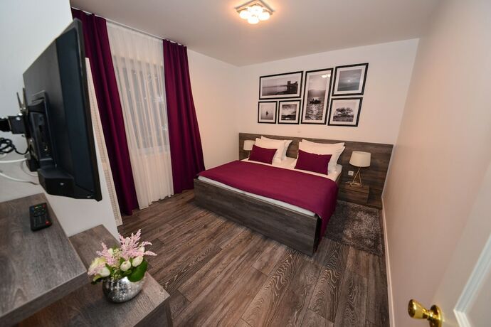 Imagen de la habitación del Hotel Sunset Deluxe Apartments. Foto 14