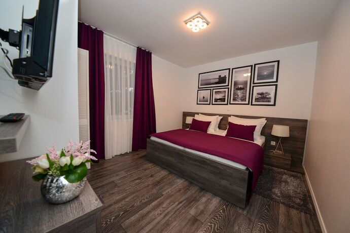 Imagen de la habitación del Hotel Sunset Deluxe Apartments. Foto 19