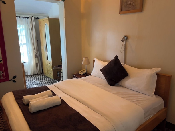 Imagen de la habitación del Hotel Sunset Entebbe. Foto 16
