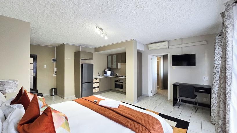 Imagen de la habitación del Hotel Sunset Events and Accommodation. Foto 4