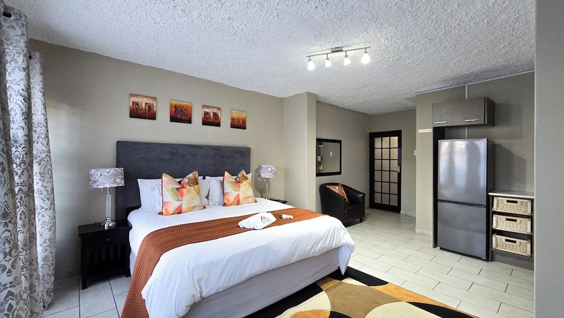 Imagen de la habitación del Hotel Sunset Events and Accommodation. Foto 5