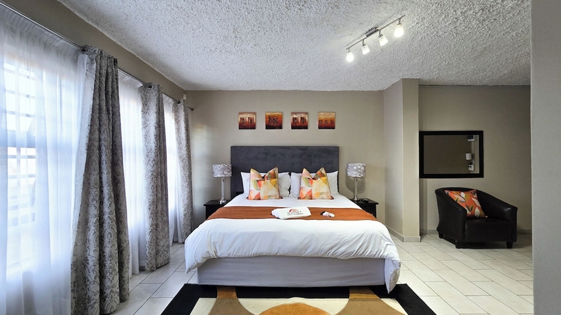 Imagen de la habitación del Hotel Sunset Events and Accommodation. Foto 7