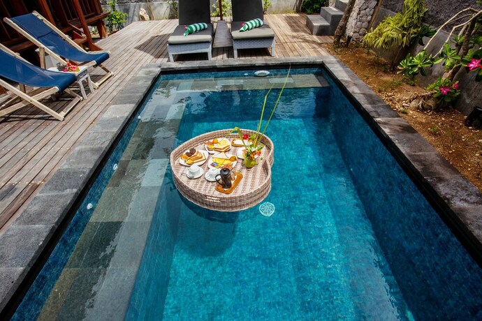 Imagen de la habitación del Hotel Sunset Garden Nusa Lembongan. Foto 16