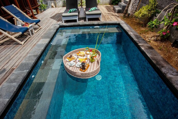 Imagen de la habitación del Hotel Sunset Garden Nusa Lembongan. Foto 23