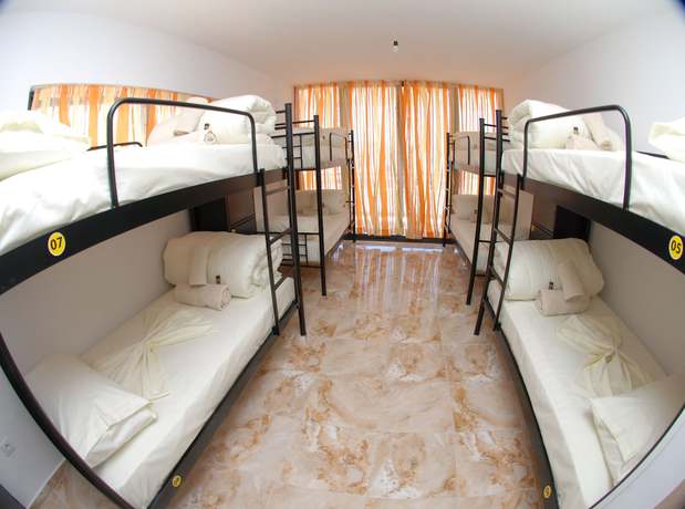 Imagen de la habitación del Hotel Sunset Hostel. Foto 11