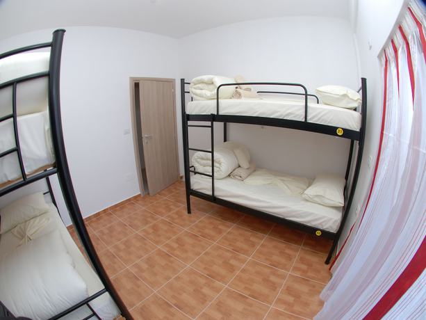Imagen de la habitación del Hotel Sunset Hostel. Foto 12