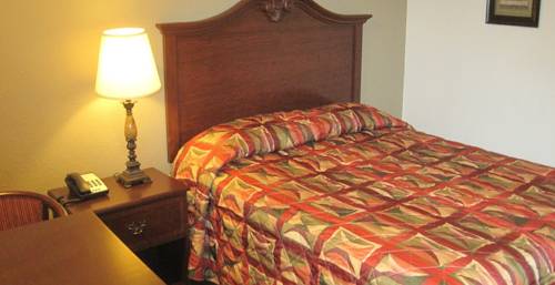 Imagen de la habitación del Hotel Sunset Inn And Suites. Foto 5