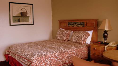 Imagen de la habitación del Hotel Sunset Inn And Suites. Foto 7