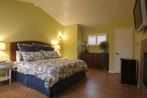 Imagen de la habitación del Hotel Sunset Inn Pacific Grove. Foto 12