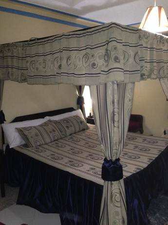 Imagen de la habitación del Hotel Sunset International. Foto 12