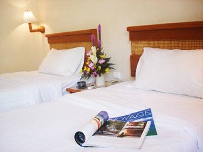 Imagen de la habitación del Hotel Sunset Mansion. Foto 13