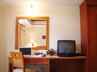 Imagen de la habitación del Hotel Sunset Mansion. Foto 15