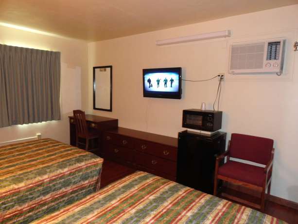 Imagen de la habitación del Hotel Sunset Motel. Foto 5