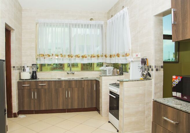 Imagen de la habitación del Hotel Sunset Paradise Holiday Homes. Foto 15